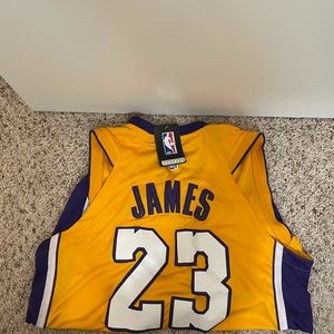 NBA Lakers Lebron James #23 jersey. DRY-FIT. NEW W/TAGS!  *SOLD*